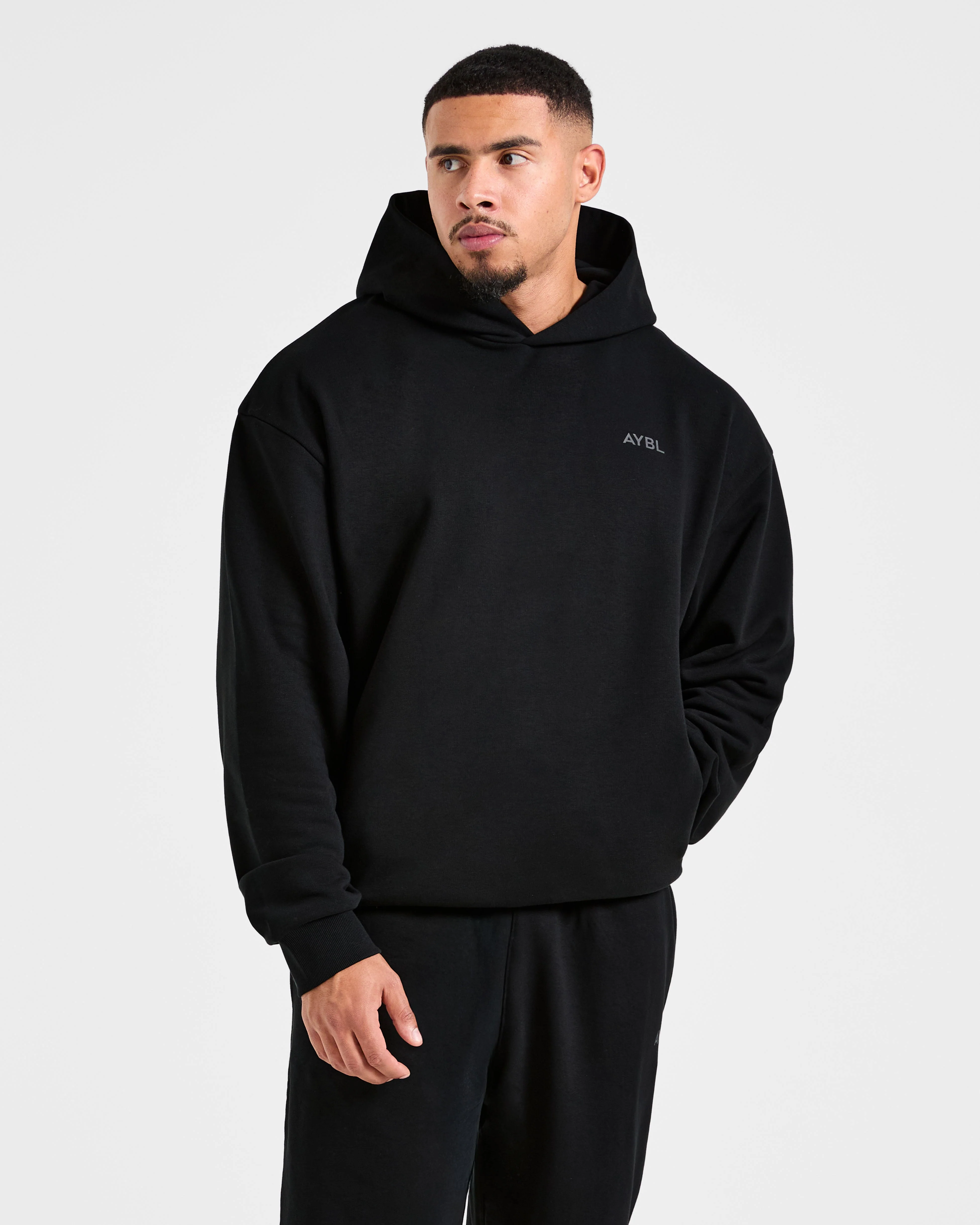 Essential Oversized Graphic Hoodie - Black - Image 2